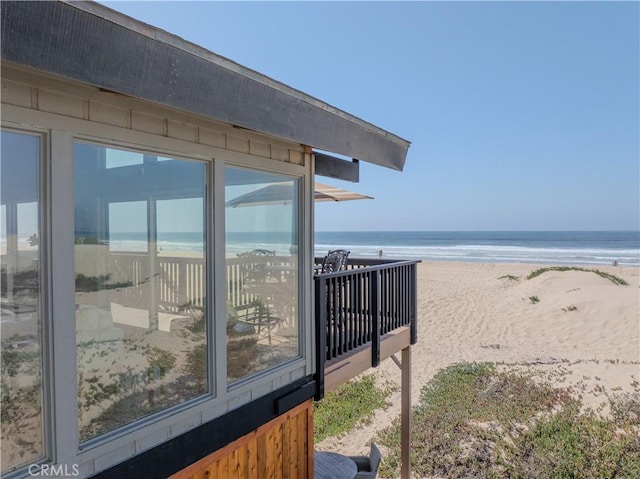 property view of water with a beach view