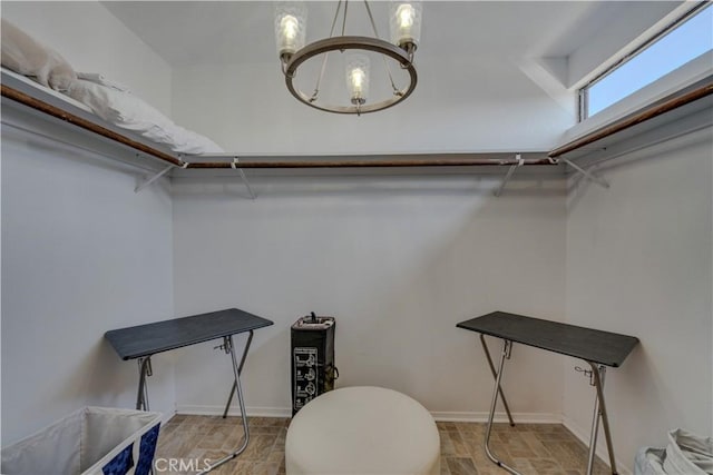 1612 Strand, Oceano, CA 93445 - walk in closet featuring a chandelier