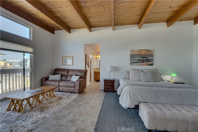 bedroom featuring access to exterior, wood ceiling, beamed ceiling, and ensuite bathroom