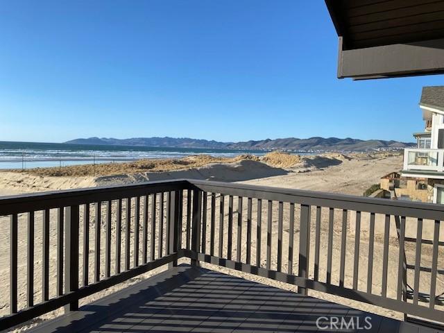 1612 Strand, Oceano, CA 93445 - wooden terrace with a water and mountain view