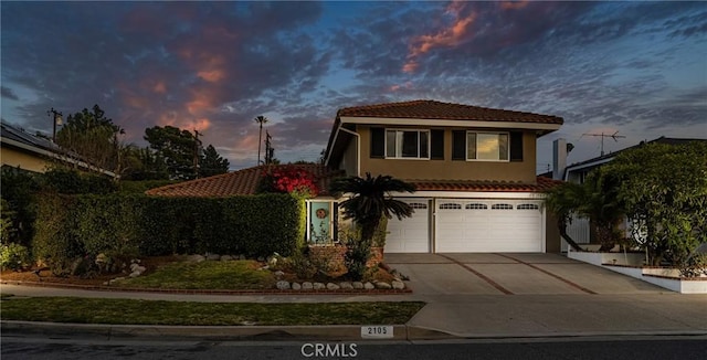 view of front of property featuring a garage