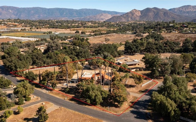 drone / aerial view featuring a mountain view