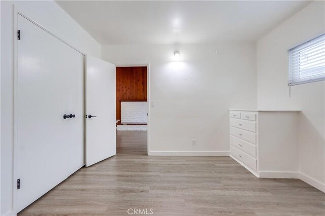 unfurnished bedroom with light hardwood / wood-style flooring