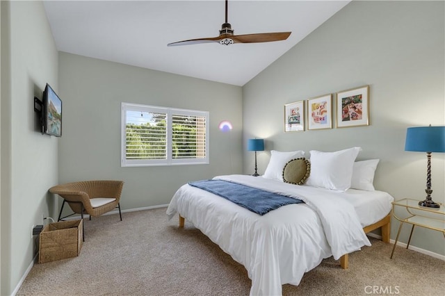 carpeted bedroom with baseboards, ceiling fan, and vaulted ceiling