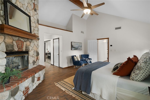 bedroom featuring a fireplace, high vaulted ceiling, ceiling fan, and dark wood-type flooring