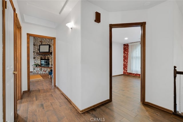 hallway featuring hardwood / wood-style floors