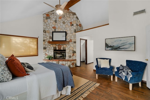 bedroom with ceiling fan, a fireplace, high vaulted ceiling, and dark hardwood / wood-style floors