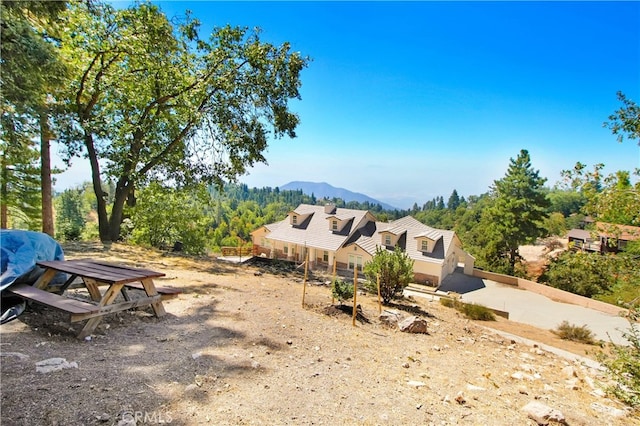 exterior space featuring a mountain view