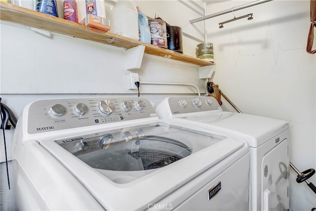 laundry room featuring washer and clothes dryer