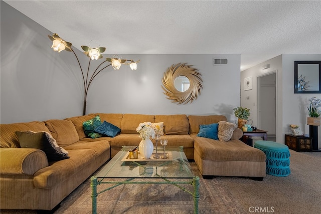 living room with a textured ceiling and carpet