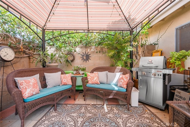 view of patio / terrace with area for grilling and an outdoor living space