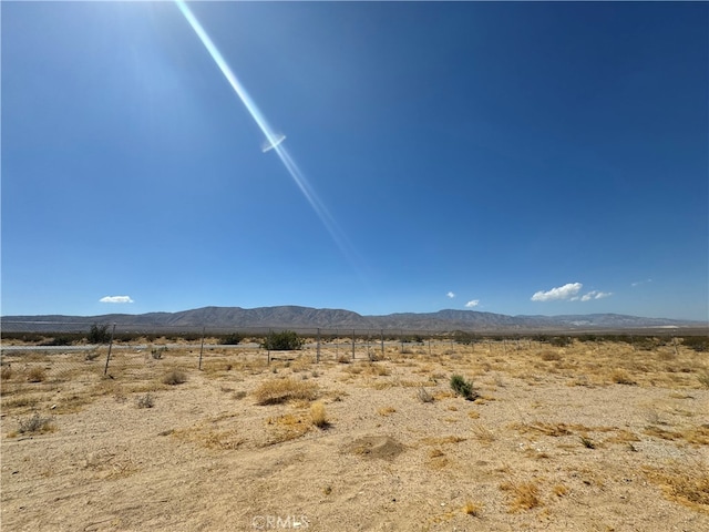 property view of mountains featuring a rural view