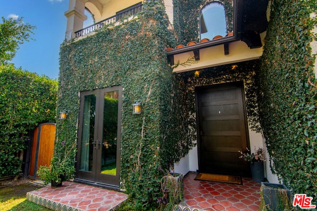 view of exterior entry with french doors