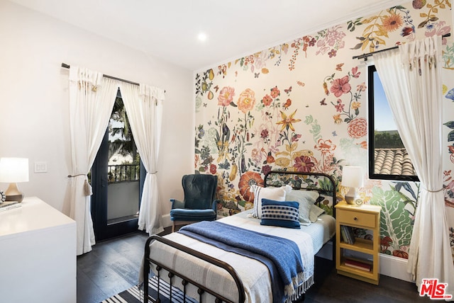 bedroom featuring dark hardwood / wood-style floors