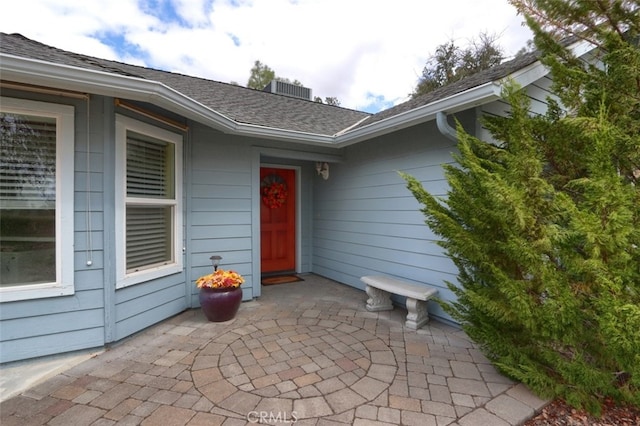 doorway to property with a patio