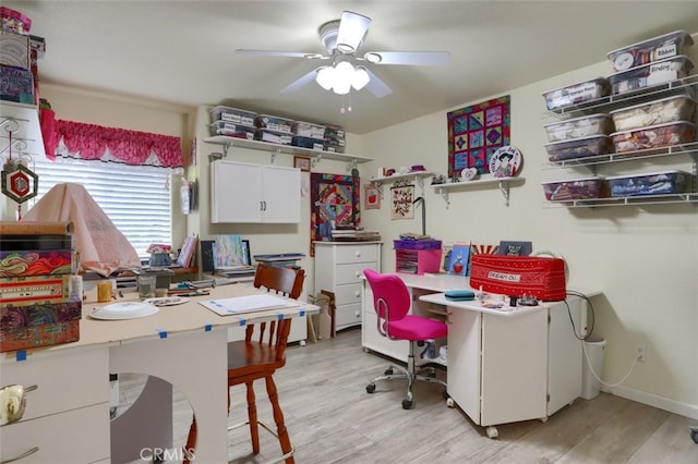 office area with ceiling fan and light hardwood / wood-style flooring