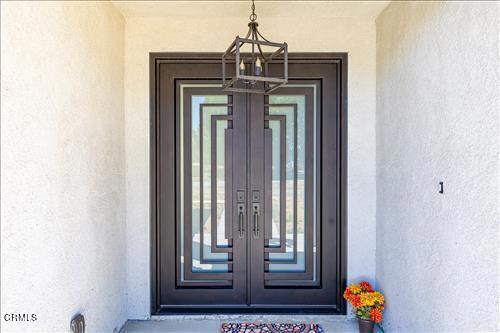 entrance to property featuring french doors