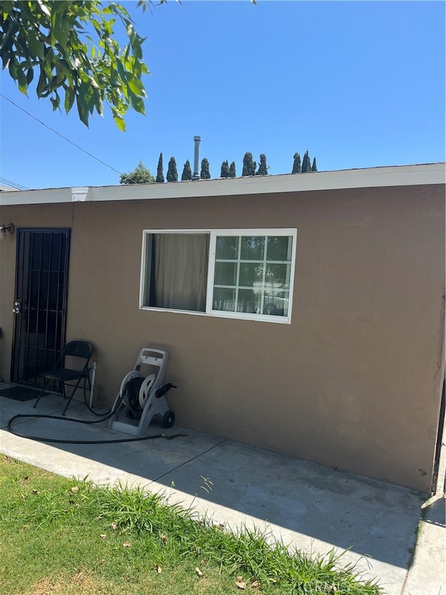 rear view of house with a patio area