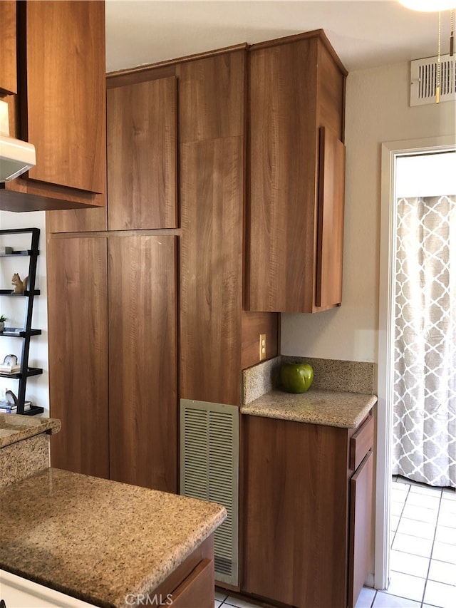 kitchen featuring light tile patterned floors