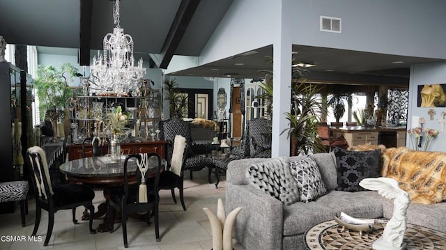 tiled dining space with high vaulted ceiling and an inviting chandelier