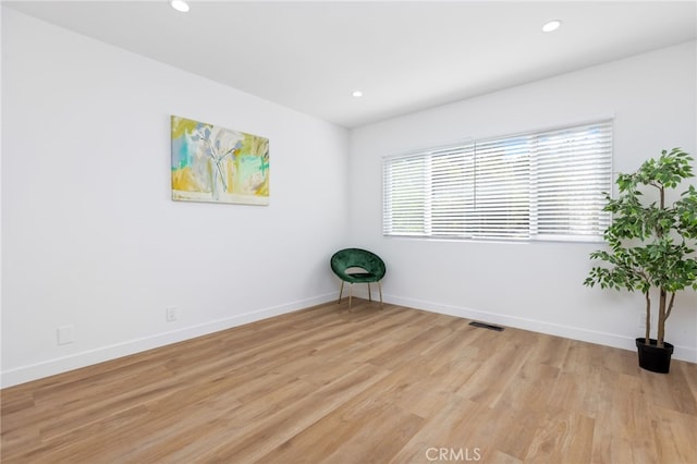 empty room featuring light hardwood / wood-style floors