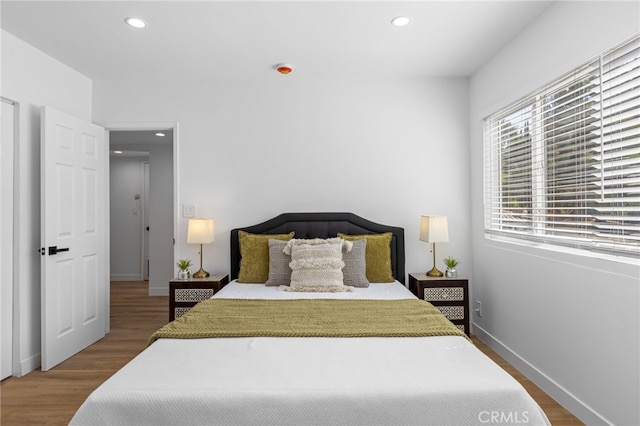 bedroom featuring hardwood / wood-style floors