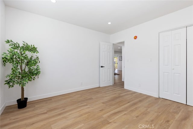 unfurnished bedroom featuring light hardwood / wood-style floors