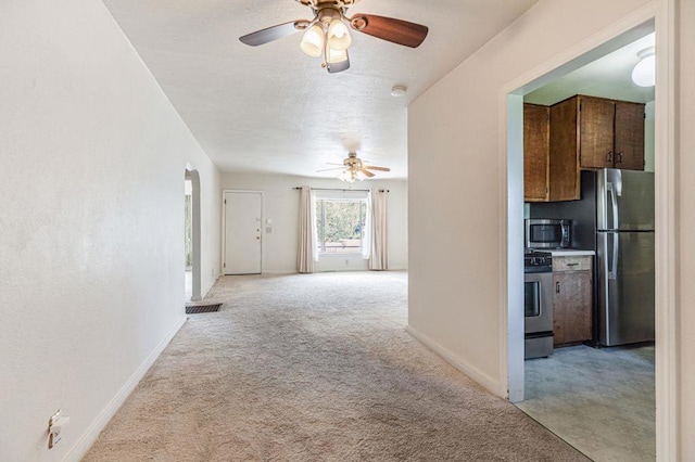 corridor with light colored carpet