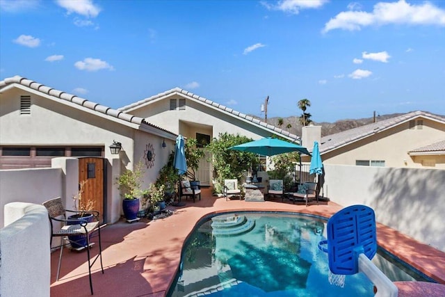 view of pool with a patio