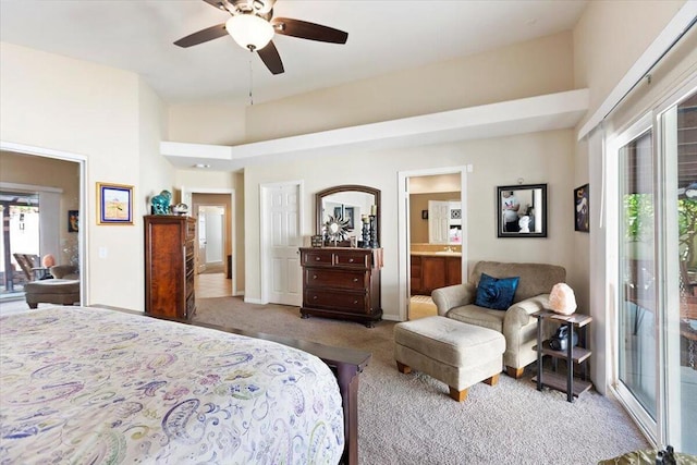 bedroom featuring carpet flooring, connected bathroom, ceiling fan, a high ceiling, and access to outside