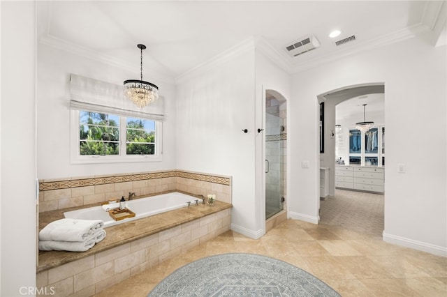 bathroom featuring tile patterned floors, ornamental molding, a chandelier, and plus walk in shower