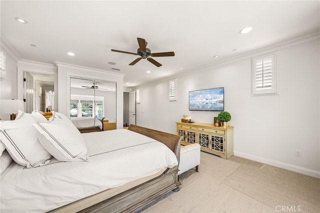 bedroom with ornamental molding, light carpet, and ceiling fan