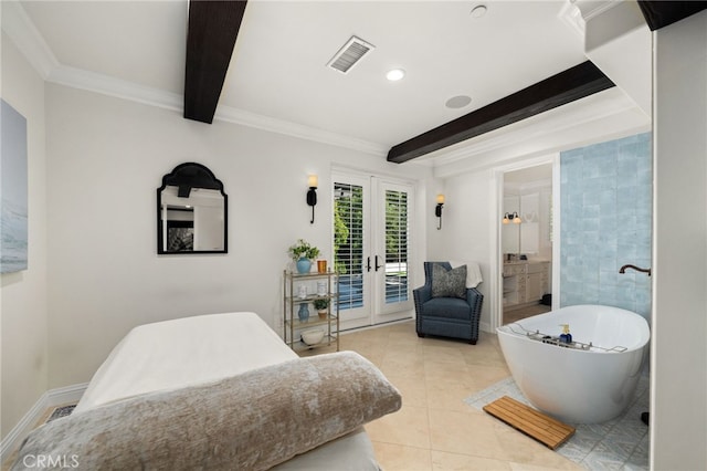 bedroom with beamed ceiling, french doors, access to exterior, and ensuite bath