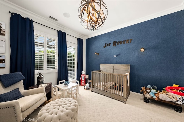 carpeted bedroom featuring crown molding, a nursery area, and a notable chandelier