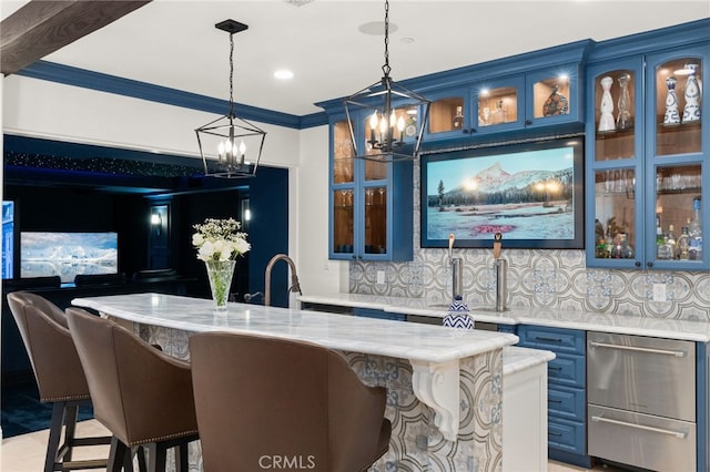 bar with ornamental molding, light stone counters, pendant lighting, blue cabinetry, and decorative backsplash