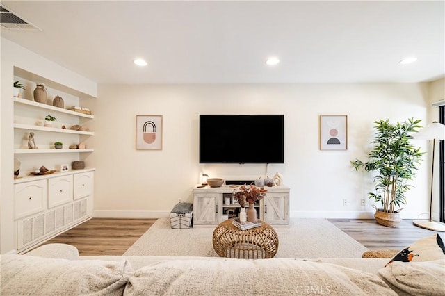 living room featuring light hardwood / wood-style floors