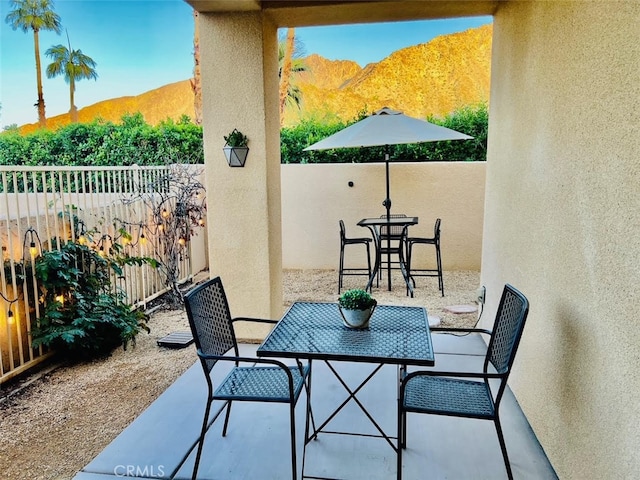 view of patio with a mountain view