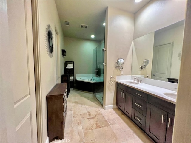 bathroom with vanity and plus walk in shower