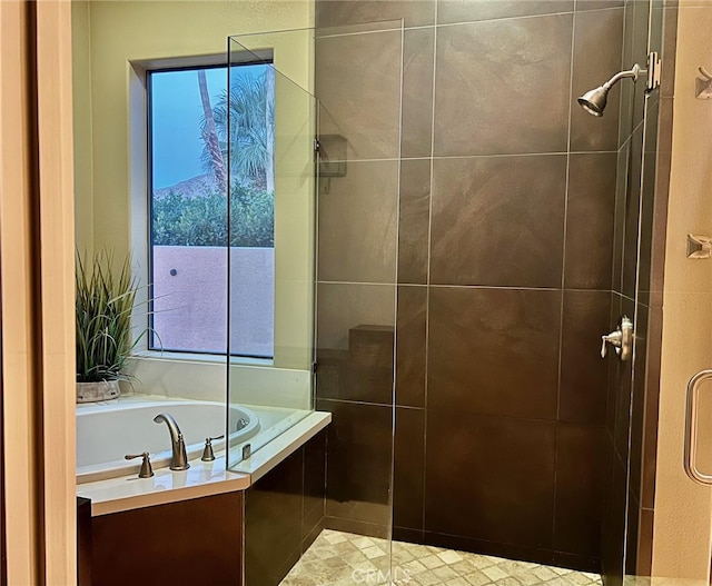 bathroom with independent shower and bath