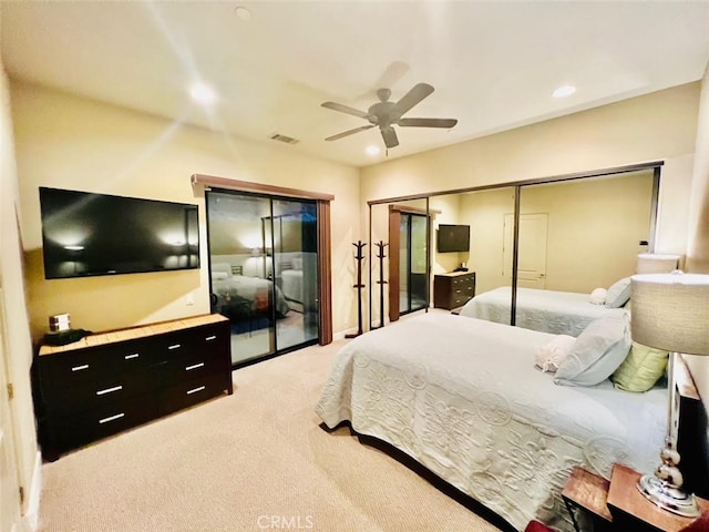 bedroom with ceiling fan, light colored carpet, and access to exterior