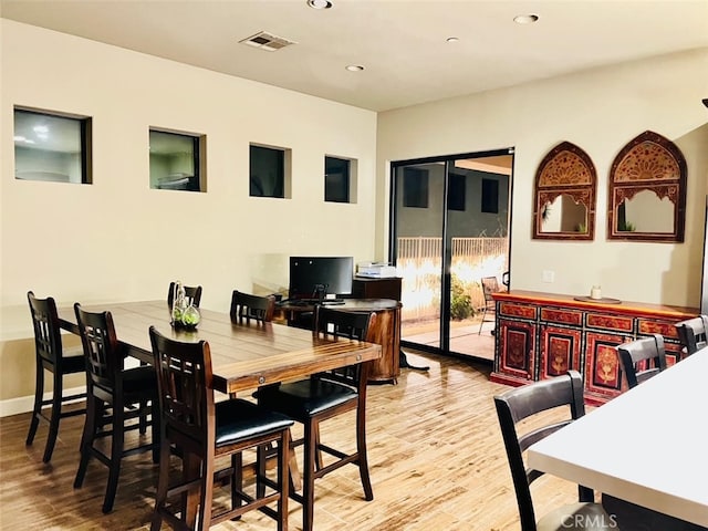 dining room featuring light hardwood / wood-style flooring