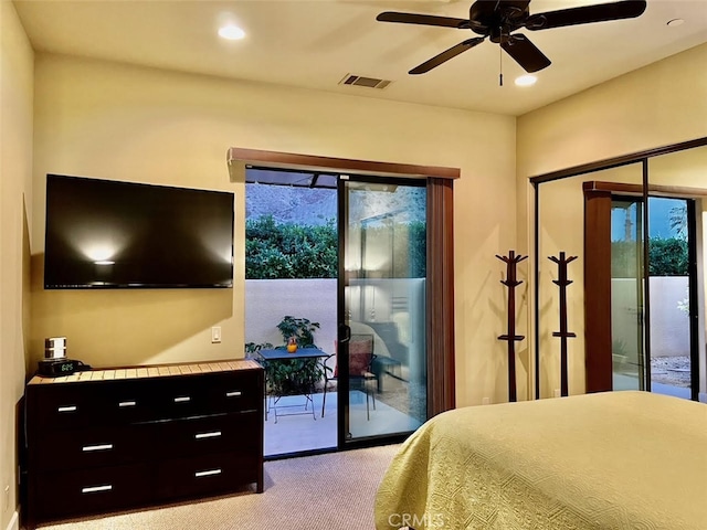 carpeted bedroom featuring ceiling fan and access to exterior