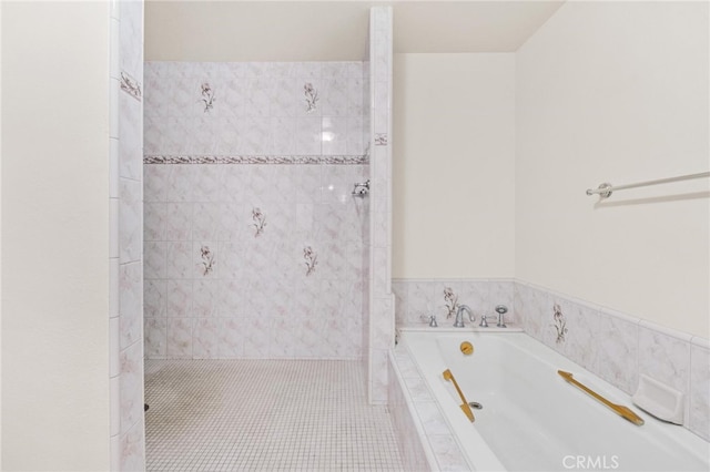 bathroom featuring plus walk in shower and tile patterned flooring