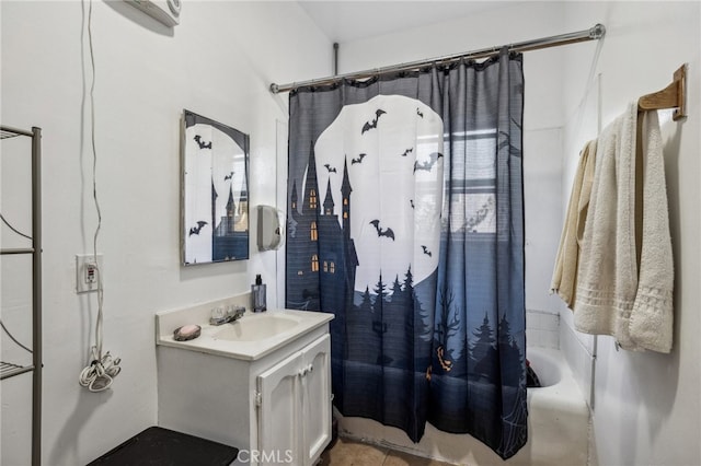 bathroom featuring vanity and shower / bath combo with shower curtain