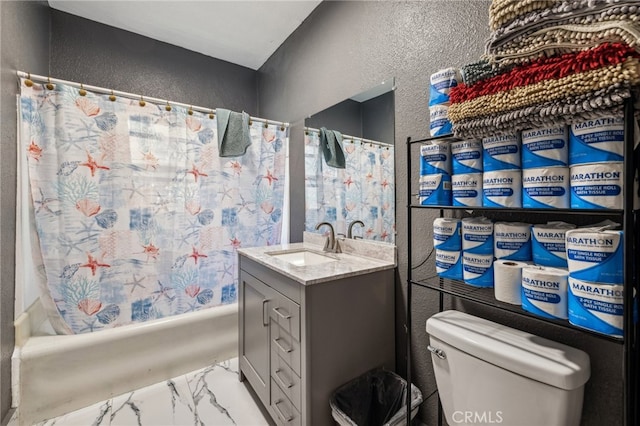 full bathroom with shower / bath combination with curtain, vanity, and toilet