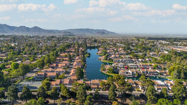 aerial view with a water and mountain view