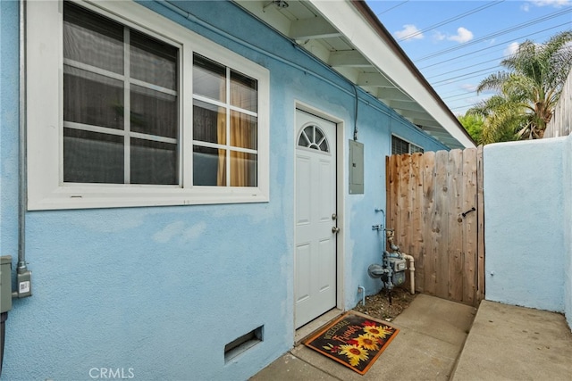 entrance to property featuring electric panel