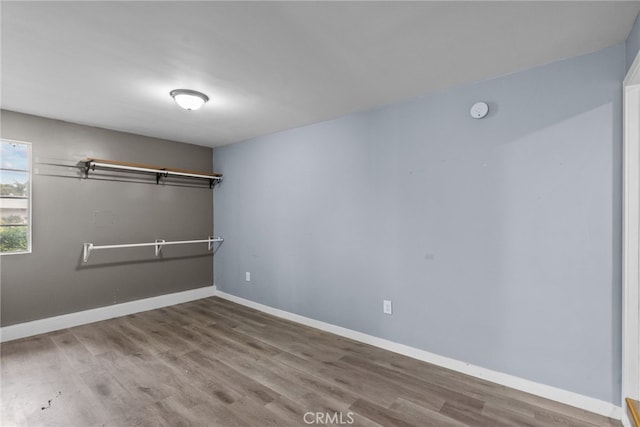 unfurnished room featuring hardwood / wood-style floors