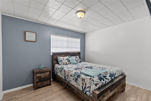 bedroom featuring light wood-type flooring