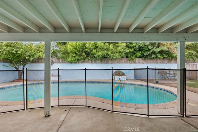 view of pool featuring a patio area